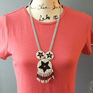 Artisan Crafted Beaded Necklace with Black and White Accents